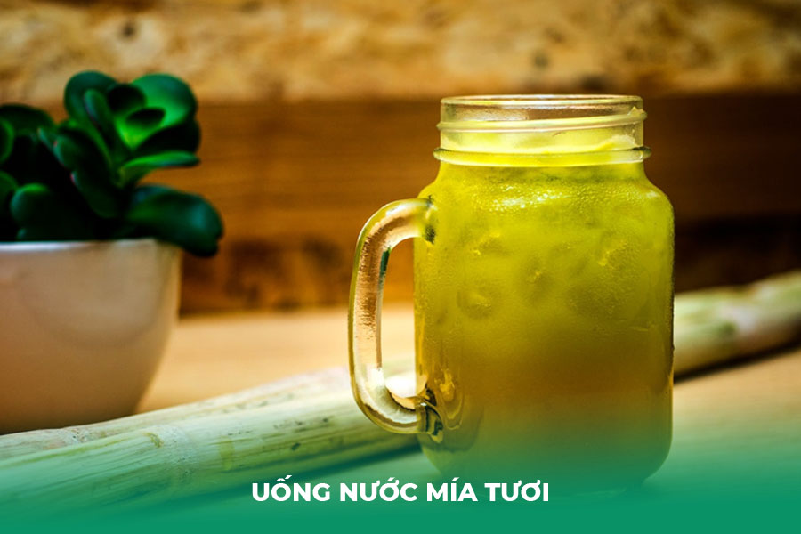 Uống nước mía tươi